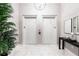 Elegant lobby featuring modern elevators, marble floors, and tasteful decor create a welcoming atmosphere at 1335 2Nd St # 402, Sarasota, FL 34236