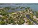 Breathtaking aerial view features waterfront condos, lush landscaping, and picturesque water views at 1617 Brookhouse Dr # 255, Sarasota, FL 34231