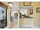 Kitchen view featuring a breakfast bar leading to a modern, well-equipped space at 1617 Brookhouse Dr # 255, Sarasota, FL 34231