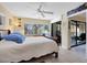 Serene main bedroom with bright windows and direct access to outdoor space at 1617 Brookhouse Dr # 255, Sarasota, FL 34231