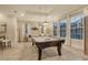 Well-lit game room featuring a pool table, recessed lighting, and neutral colored walls at 19610 66Th E Ave, Bradenton, FL 34211