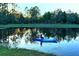 Enjoy kayaking in the private pond surrounded by lush greenery and tranquil views of the surrounding landscape at 19610 66Th E Ave, Bradenton, FL 34211