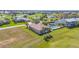 Wide aerial view of the home, inground pool, lush greenery, and waterfront surroundings at 2080 Padre Island Dr # 211, Punta Gorda, FL 33950