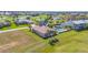 Wide aerial view of the home, inground pool, lush greenery, and waterfront surroundings at 2080 Padre Island Dr # 211, Punta Gorda, FL 33950