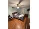 Cozy bedroom with a ceiling fan and natural light creates a relaxing atmosphere at 2107 36Th E Ave, Palmetto, FL 34221