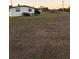 Exterior shot of the house surrounded by a large, grassy yard at 2107 36Th E Ave, Palmetto, FL 34221