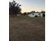 Exterior view of the house and yard in a residential neighborhood at 2107 36Th E Ave, Palmetto, FL 34221