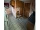 View of the kitchen featuring classic cabinets and tile flooring at 2107 36Th E Ave, Palmetto, FL 34221