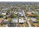 Expansive aerial view of a residential neighborhood with tree-lined streets and well-kept homes at 2202 Waldemere St, Sarasota, FL 34239