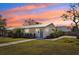 Charming exterior view of a single-story home with a well-kept lawn and modern design at 2202 Waldemere St, Sarasota, FL 34239