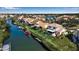 Scenic waterfront community with lush landscaping and private docks along the canal at 27 Inlets Blvd # 27, Nokomis, FL 34275