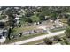 Expansive fenced lot featuring ample parking, storage for boats, and utility trailers in a residential community at 27 Inlets Blvd # 27, Nokomis, FL 34275