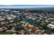 High-angle aerial view of a waterfront community with beautiful canals flowing through a picturesque neighborhood at 27 Inlets Blvd # 27, Nokomis, FL 34275