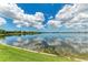 Scenic view of the lake and residential neighborhood on the opposite shore at 272 Maraviya Blvd, Nokomis, FL 34275