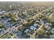 Scenic aerial view of a suburban neighborhood featuring lush greenery, roadways and single-Gathering homes at 2746 Tangelo Dr, Sarasota, FL 34239