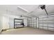 Two-car garage with an automatic door, and a storage unit at 2746 Tangelo Dr, Sarasota, FL 34239