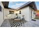 Inviting outdoor patio featuring lounge chairs, a black and white patterned rug, and comfortable seating at 2746 Tangelo Dr, Sarasota, FL 34239