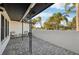 Inviting front patio featuring stone pavers and comfortable seating, perfect for relaxing outdoors at 2746 Tangelo Dr, Sarasota, FL 34239