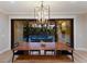 Dining room showcasing a view of the patio and pool through sliding glass doors at 2823 Marshall Dr, Sarasota, FL 34239