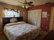 Comfortable main bedroom featuring cozy textures, a ceiling fan, and ample space at 3252 Patton St, Sarasota, FL 34235