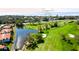 Overhead view of property on Sarasota Bay featuring golf course, lake, and beautiful scenery at 3500 El Conquistador Pkwy # 336, Bradenton, FL 34210