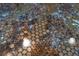 Unique countertop inlaid with pennies covered in clear epoxy at 3951 Palau Dr, Sarasota, FL 34241