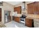 Well-equipped kitchen features stainless steel appliances and ample storage space at 3951 Palau Dr, Sarasota, FL 34241