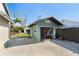 View of shed from the backyard with the door open at 3951 Palau Dr, Sarasota, FL 34241