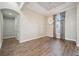 Inviting living room with wood floors, chandelier, and neutral paint at 4744 Benito Ct, Lakewood Ranch, FL 34211