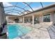 Resort-style pool with spa, covered patio, ceiling fans, and outdoor seating at 4744 Benito Ct, Lakewood Ranch, FL 34211