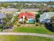 Bird's-eye view of a beautiful home featuring a private pool and lush landscaping at 5080 Kilty E Ct, Bradenton, FL 34203