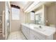 Bathroom featuring a double sink vanity and modern fixtures at 5080 Kilty E Ct, Bradenton, FL 34203