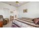 Bright bedroom with closet space and a glimpse into an ensuite bathroom at 5080 Kilty E Ct, Bradenton, FL 34203