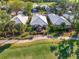 Aerial view showcases the neighborhood surrounding the landscaped golf course at 538 Fallbrook Dr, Venice, FL 34292