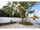 Backyard area featuring mature tree and minimal landscaping at 5419 1St W Ave, Bradenton, FL 34209