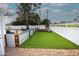 Well-maintained backyard featuring artificial turf and a playground at 5419 1St W Ave, Bradenton, FL 34209