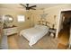 Relaxing bedroom with natural light, stylish furniture, and decor at 5419 1St W Ave, Bradenton, FL 34209