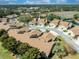 Birds eye view of the townhome nestled within a community featuring mature trees and lush landscaping at 5618 Monte Rosso Rd, Sarasota, FL 34243