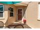 Inviting entrance showcasing a decorative door, ample natural light, and a well-maintained exterior at 5618 Monte Rosso Rd, Sarasota, FL 34243