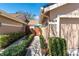 Inviting home exterior with a well-maintained walkway leading to a charming entrance and a two-car garage at 5618 Monte Rosso Rd, Sarasota, FL 34243