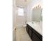 Bathroom with a white sink, dark brown cabinet and a tub shower at 5638 Oakshire Ave, Sarasota, FL 34233