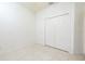 Bright bedroom with a closet and tile floor at 5638 Oakshire Ave, Sarasota, FL 34233