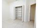 Bedroom closet with shelving and doors at 5638 Oakshire Ave, Sarasota, FL 34233