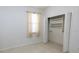 Light, bright bedroom with a window and closet at 5638 Oakshire Ave, Sarasota, FL 34233