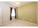 Bedroom with window and ceiling fan at 5638 Oakshire Ave, Sarasota, FL 34233