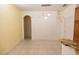 Open dining room with tile flooring, a hanging light fixture, and natural light at 5638 Oakshire Ave, Sarasota, FL 34233