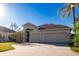 Inviting single-Gathering home with a spacious front lawn and a two-car garage at 5638 Oakshire Ave, Sarasota, FL 34233