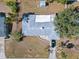 Aerial view of the property showcasing its roof and surrounding landscape at 5724 25Th W St, Bradenton, FL 34207