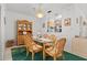 Formal dining area with stylish table, chairs, hutch and lovely decor at 5724 25Th W St, Bradenton, FL 34207