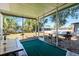 Relaxing screened porch with a view of the backyard at 5724 25Th W St, Bradenton, FL 34207